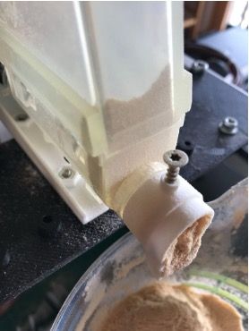 Essai de dosage de poudre sur un prototype.
